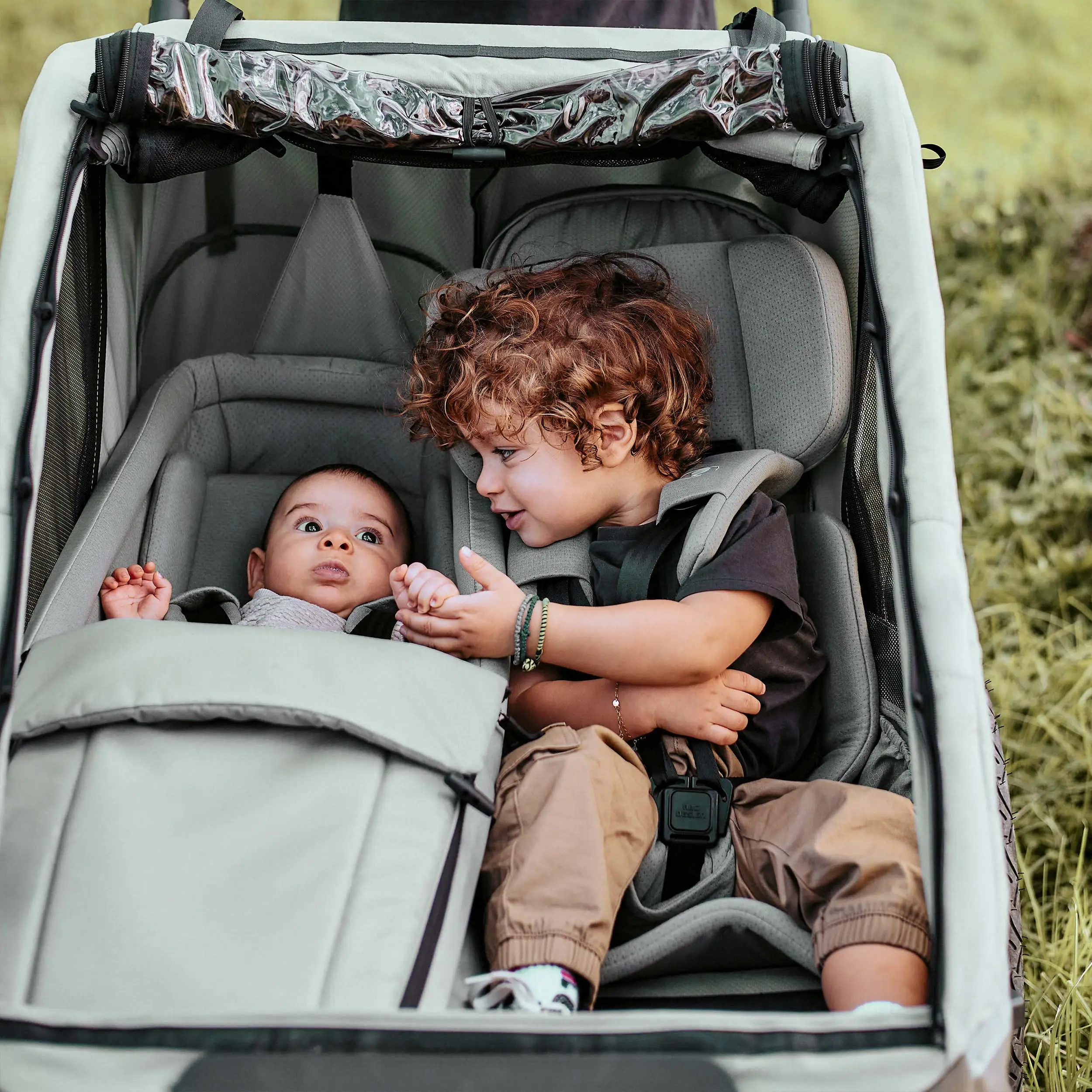 Rimorchio per biciclette Tour 2 con 2 comodi sedili e Ruote con camera d’aria - Olive